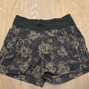 Athleta Floral High-Rise Running Shorts with Zipper Pocket